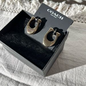 Coach chunky gold hoop earrings with “diamonds”